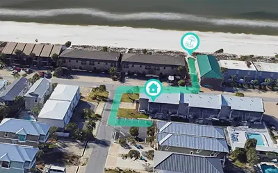 an aerial view of a resort with a train at Misty Harbour 7 in Panama City Beach