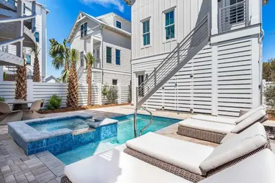 a swimming pool in the backyard of a house at 30A Sunrise in Santa Rosa Beach