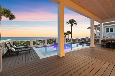 a view of the ocean from the deck of a house at Jewel of Oleander by 30A Escapes in Panama City Beach
