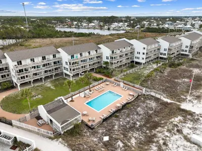 an aerial view of an apartment complex with a swimming pool at Ramsgate Harbour #5 by 30A Escapes in Panama City Beach