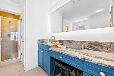 a bathroom with a blue sink and a shower at Beach House - Sea La Vie by Panhandle Getaways in Panama City Beach