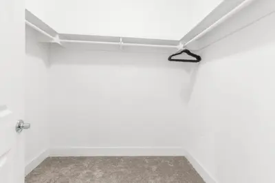 a white bathroom with a towel rack on the wall at Salty Sons 4 BR and just minutes to the Beach Rosemary and 30Avenue in Inlet Beach