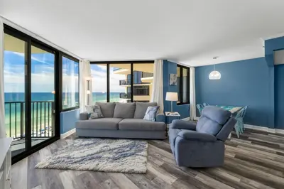 a living room with a couch and two chairs at Sunbird Resort! Awe-inspiring Views Throughout! hosted by Dolce Vita Getaways PCB in Panama City Beach
