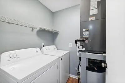 a laundry room with a washer and dryer at Mimi's Beach Bungalow in Panama City Beach