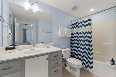 a bathroom with a sink and a toilet and a shower at Palazzo #505 by InJoy Vacations in Panama City Beach