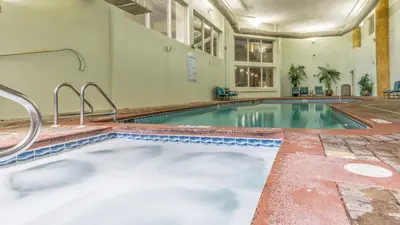 a large swimming pool in a building with a pool at Shores of Panama #1230 by Nautical Properties in Panama City Beach