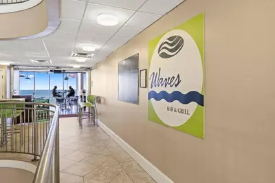 a hospital hallway with a sign on the wall at Ocean Front Condo 29th Floor - Must be 25 to Book in Panama City Beach