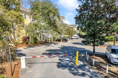 a street with a road sign in the middle at Coastside 2 BR with 2BA Sleeps 6 Bikes and Pool View in Santa Rosa Beach