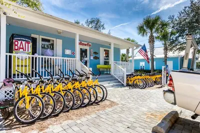 a row of bikes parked in front of a store at Coastside 2 BR with 2BA Sleeps 6 Bikes and Pool View in Santa Rosa Beach