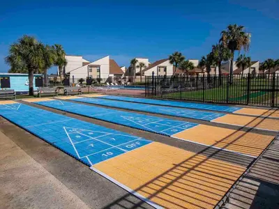 a swimming pool with a blue and yellow at Horizon South 60-203 in Panama City Beach