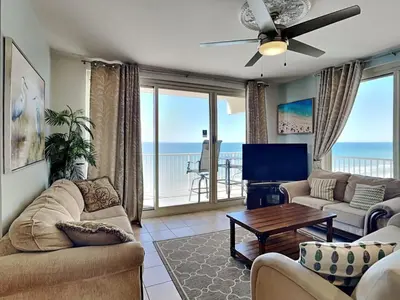 a living room with a view of the ocean at Shores of Panama #1129 in Panama City Beach