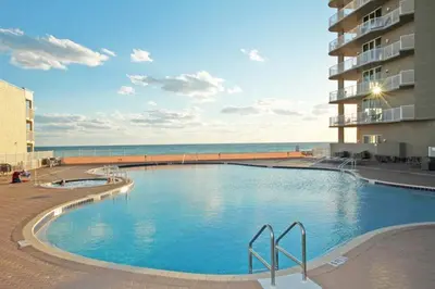 a large swimming pool in front of a building at Tidewater Beach Resort #1501 in Panama City Beach