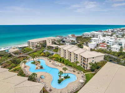 an aerial view of a resort with a pool and the ocean at HP 325 Sandy Bottoms by 30A Escapes in Rosemary Beach