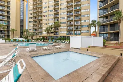 an image of a swimming pool in a apartment building at Summerhouse Beach Resort by Panhandle Getaways in Panama City Beach