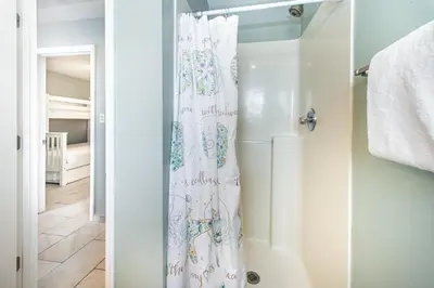 a shower curtain in a bathroom with a shower at Beachside Villas 814 in Santa Rosa Beach