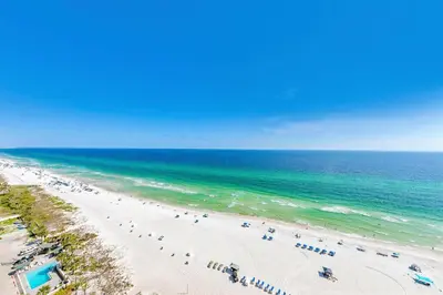 an overhead view of a beach with chairs and the ocean at Sterling Reef 1504 in Panama City Beach