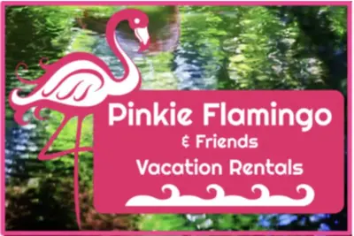 a pink sign with a pink flamingo on it at Endless Summer Nights at Seacrest in Inlet Beach