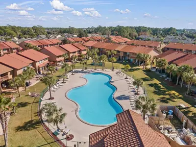 an aerial view of a resort with a swimming pool at 135 Grande Island Blvd in Panama City Beach