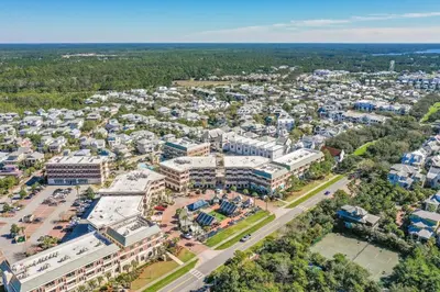 an aerial view of a campus with buildings at Newly renovated overlooking the Seacrest Village Pool and Beach access in Rosemary Beach