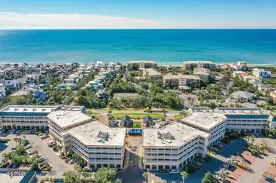 an aerial view of the resort with the ocean in the background at Overlooking 30A! Great Location! Easy Beach & Pool Access! in Rosemary Beach
