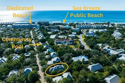 an aerial view of a resort with the beach and sea breeze at Magnolia Cottages Seacrest Flirty Flamingo - Pet Friendly Resort Pool & Beach Access! in Seacrest
