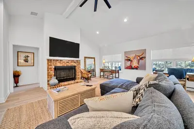 a living room with two couches and a fireplace at New Seagrove Beach Construction, Easy Beach Access, Professionally Decorated - Amazing Privacy! in Santa Rosa Beach