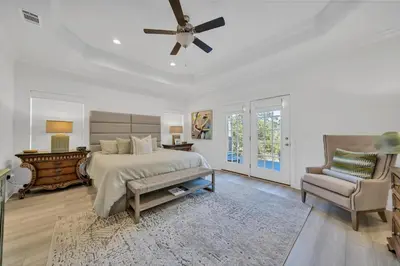 a bedroom with a bed and a ceiling fan at New Seagrove Beach Construction, Easy Beach Access, Professionally Decorated - Amazing Privacy! in Santa Rosa Beach