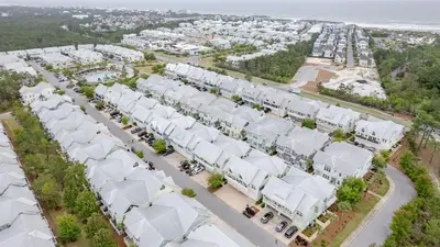 an aerial view of white roofs and buildings at Emerald Gem by AvantStay Pool Access 3mins to Beach in Panama City Beach