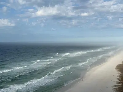 a view of the ocean and a sandy beach at Beachfront Oasis at Splash Resort and Condos in Panama City Beach