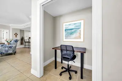 a home office with a desk and a chair at Gulf Crest 205 - Stunning Gulf Views - Huge Balcony in Panama City Beach