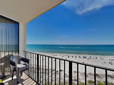 a balcony with a view of the beach at Edgewater Tower Ii 403 in Panama City Beach