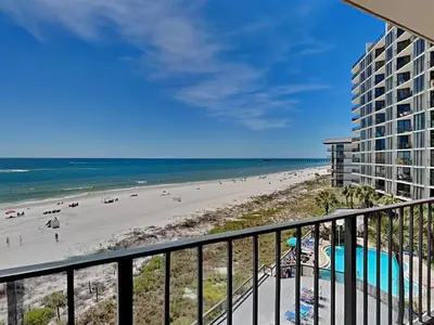 a view of the beach from the balcony of a condo at Edgewater Tower Ii 403 in Panama City Beach