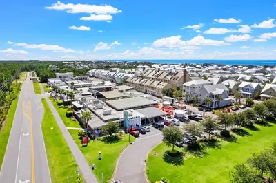 an aerial view of a town with houses and a road at Coastal Cottage at 30A in Inlet Beach