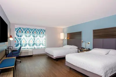a hotel room with two beds and a window at Tru By Hilton Panama City Beach in Panama City Beach