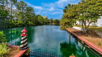 a lighthouse in the middle of a river at St Thomas Square 1208A in Panama City Beach