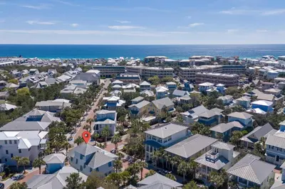 an aerial view of a city with houses and the ocean at Sugar Beach Cottage in Inlet Beach