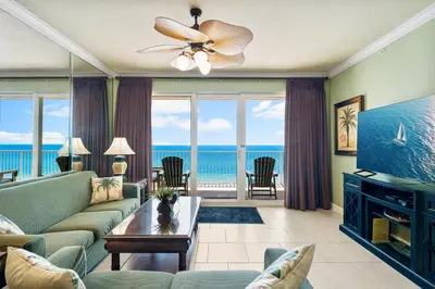 a living room with a view of the ocean at Beachfront Bliss Luxe 3BR Condo at Marisol Complex in Panama City Beach