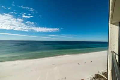 a view of a beach with birds on the sand at Edgewater 3-1113 'Ocean's 1113' in Panama City Beach