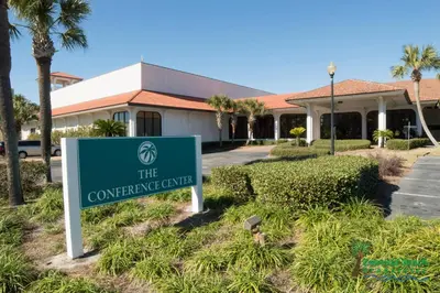 a sign in front of a building at Edgewater Villa 3001 'Vitamin Sea' in Panama City Beach
