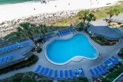 an overhead view of a swimming pool and beach at Edgewater 3-0404 'Isle Be Back' in Panama City Beach