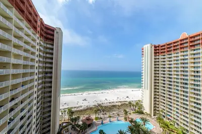 a view of the beach from the balcony of a resort at Shores of Panama 1520 'Thirsty Turtle' in Panama City Beach
