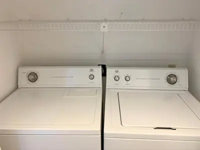 two white washers in a white refrigerator at Edgewater 2-1202 'Shore Fun Penthouse' in Panama City Beach