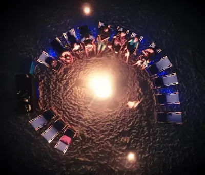 an overhead view of a group of people in a circle at Boardwalk 0605 'Good Times & Tan Lines' in Panama City Beach