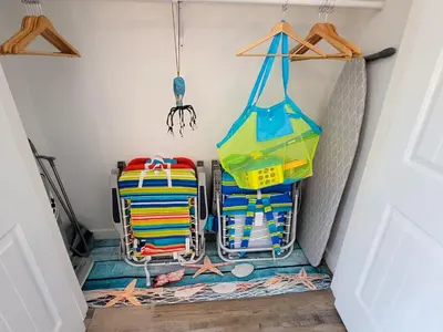 a room with a bunch of bags on the floor at Edgewater Villa 0912 'Villa de sol' in Panama City Beach