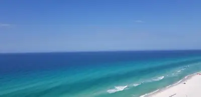 an aerial view of the ocean and a beach at Top Of The Gulf 625 'Beach Perfect' in Panama City Beach