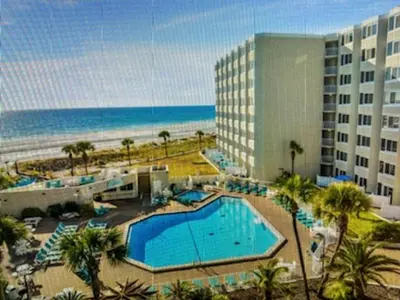 a view of a resort with a swimming pool and the beach at Top Of The Gulf 625 'Beach Perfect' in Panama City Beach