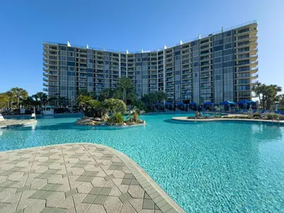 a large swimming pool in front of a large building at Edgewater 2-0409 'Paradise City' in Panama City Beach