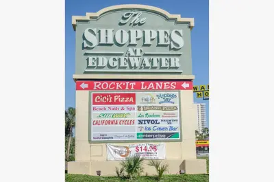 a sign for the shops at an icebergle warehouse at Edgewater W102 'Tides Edge' in Panama City Beach