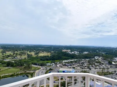a view of a city from a balcony at Boardwalk 2201 'Sea Serenity Penthouse' in Panama City Beach