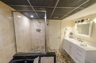 a bathroom with a shower and a sink at Edgewater 2-0405 'Make Some Waves' in Panama City Beach